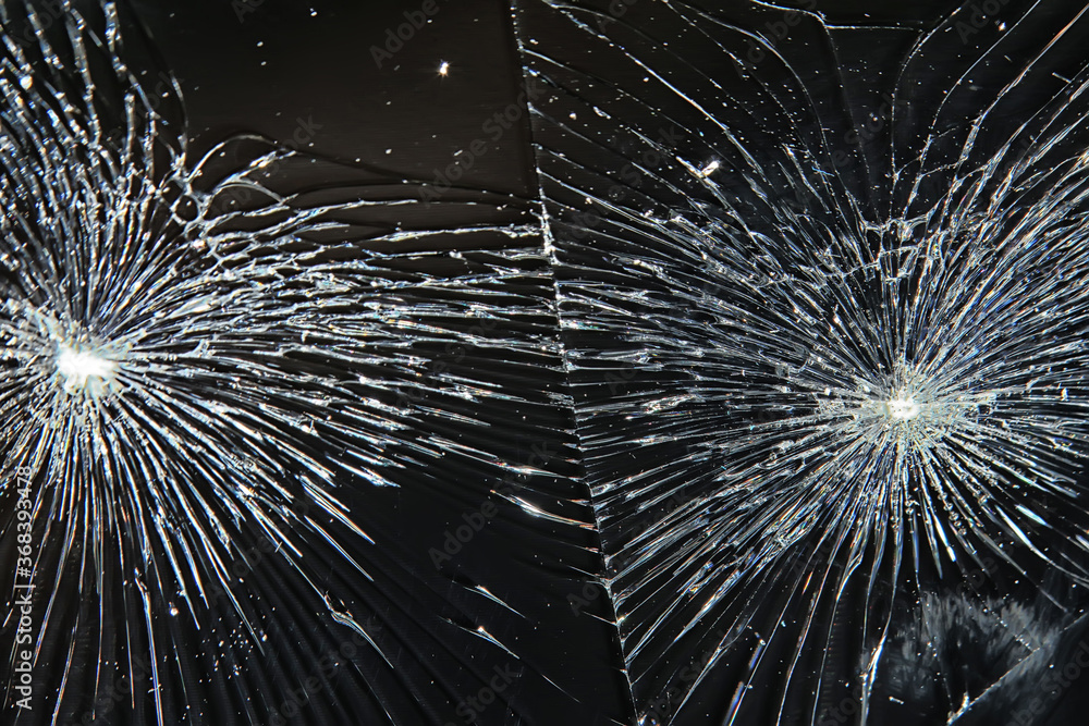 Obraz premium cracked black glass / broken glass abstract texture background