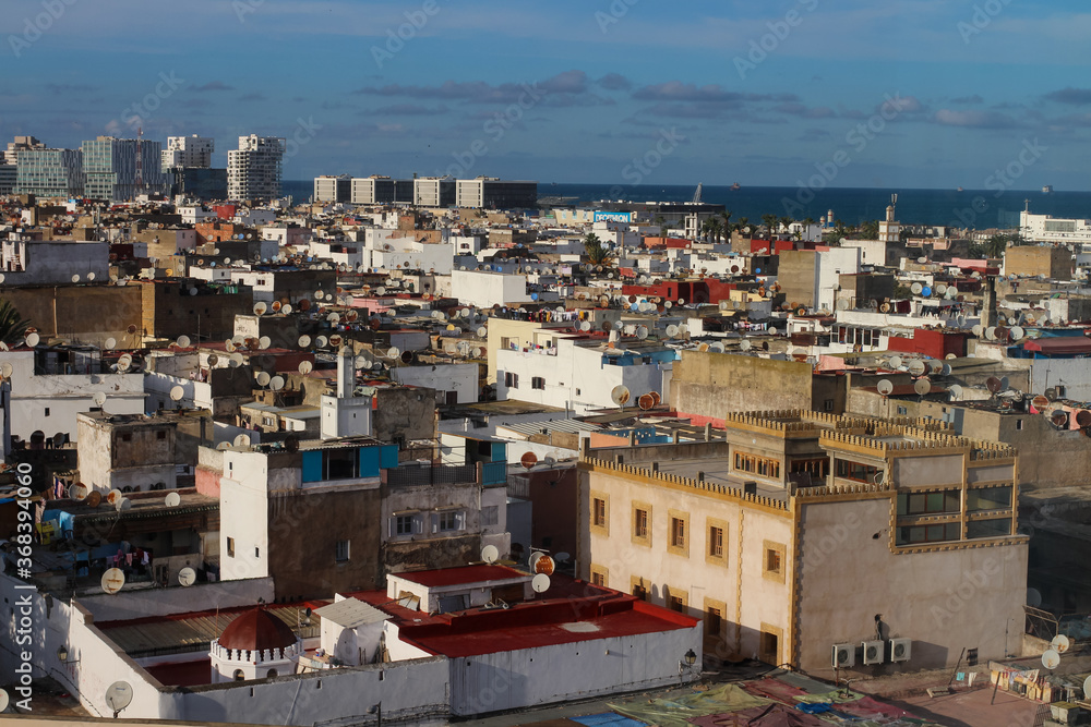 Top view of the rooftops of Casablanca and the Atlantic ocean.