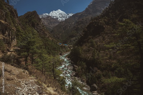 Everest base camp trekking. high mountains in Nepal. blue sky. high altitude landscape. High quality mountain river.