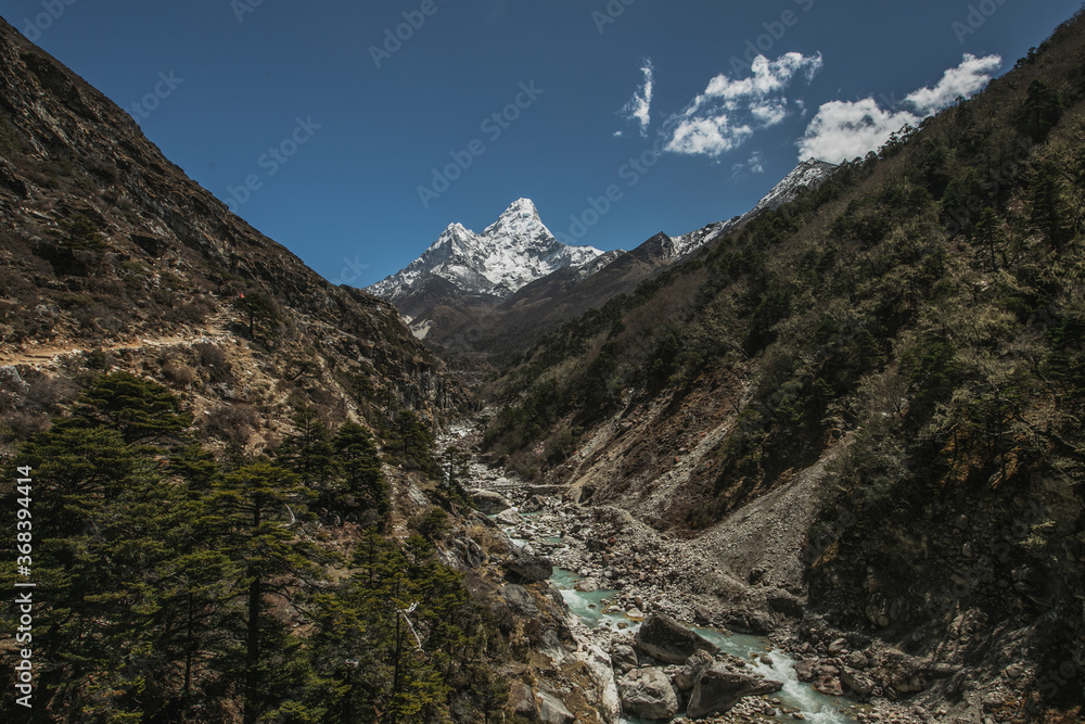 Everest base camp trekking. high mountains in Nepal. blue sky. high altitude landscape. High quality mountain river.