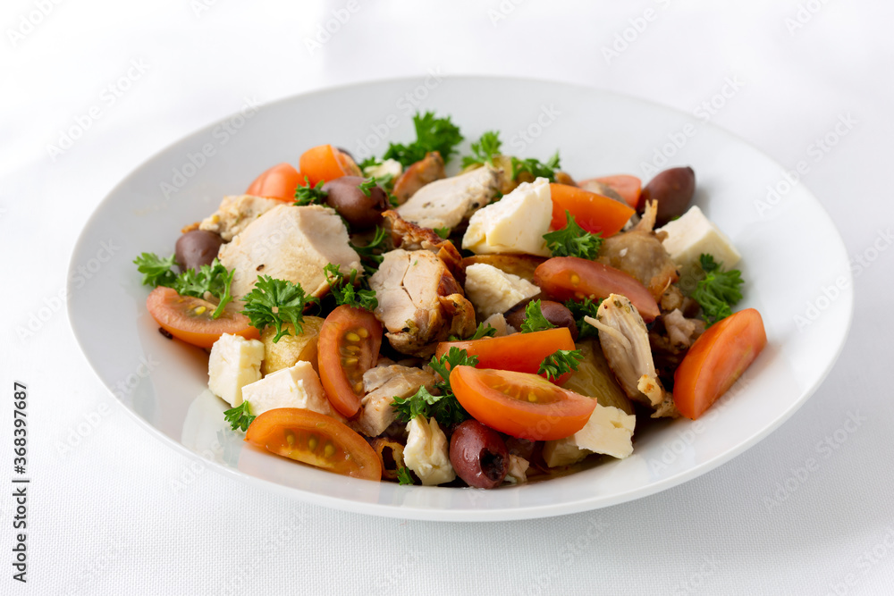 Grilled chicken salad with olives, feta cheese and tomatoes Grilled chicken salad with olives, feta cheese and tomatoes