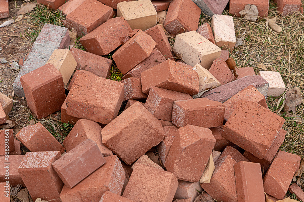 terracotta cobblestones dumped in a pile of close-up broken on the ground terracotta cobblestones dumped in a pile of close-up broken on the ground