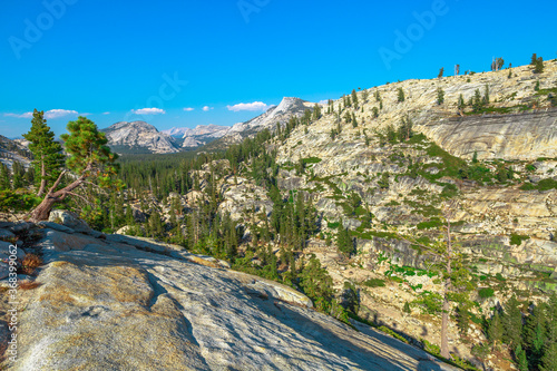 Panorama of Olmsted Point, off Tioga Pass Road in Yosemite National Park, California, United States. Top overlook to see the Clouds Rest, Half Dome and Tenaya Canyon. photo