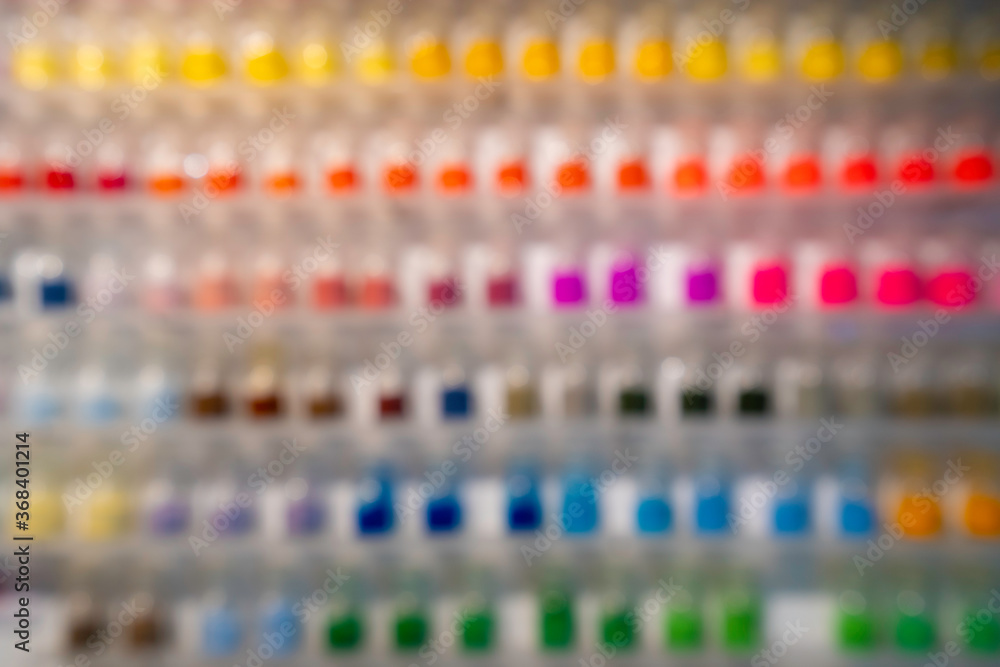 Blur background of colorful colored powder in store