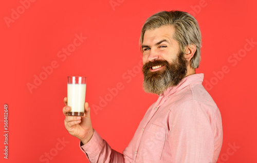 healthy beverage. Useful properties of milk soup. glass of fresh frothy milk. Nutritious protein cocktail in glass. milk for quenching thirst and for taking lot of useful vitamins