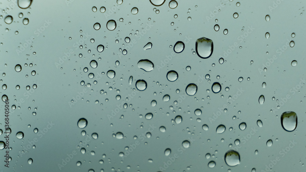 Drops of water on the glass. Macro shooting. Texture. No people. Drops of water on the glass. Macro shooting. Texture. No people.