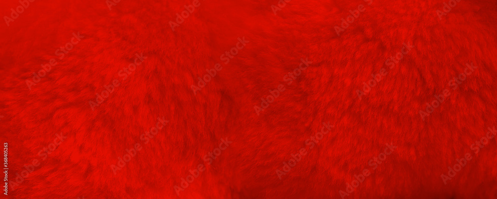 Red Fur Close Up on Faux Fur Background