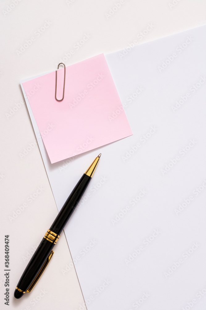 Blank paper memo with clip on white background
Blank paper memo with clip on white background