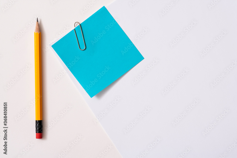 Blank paper memo with clip on white background
