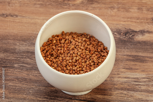 Raw bu  kwheat cereal in the bowl