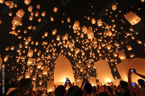 Launching floating sky lanterns in Chiang Mai, Loykratong Festival