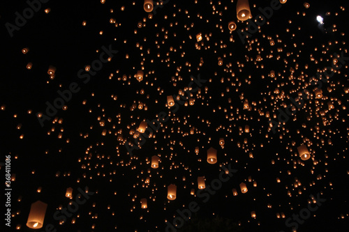 Launching floating sky lanterns in Chiang Mai, Loykratong Festival