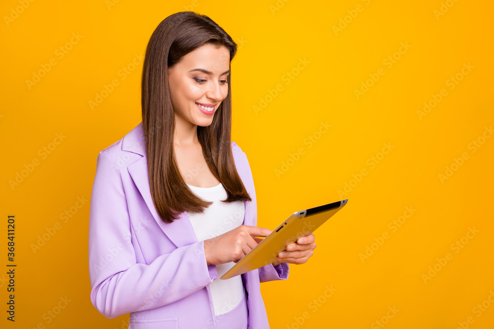 Profile photo of business lady holding e-book hands chatting colleagues partners deal corporate questions read email box wear lilac suit isolated yellow color background Profile photo of business lady holding e-book hands chatting colleagues partners deal corporate questions read email box wear lilac suit isolated yellow color background