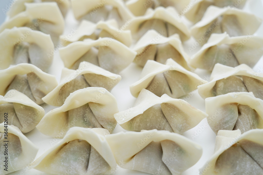 Traditional Chinese food wonton is placed on a white background Traditional Chinese food wonton is placed on a white background