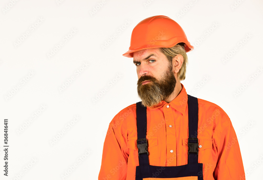 Bearded mature man in uniform. Reputation of excellent worker. Skillful worker. Electrician plumber handyman. Repairman. Construction worker. Renovation concept. Mechanic perform technical work Bearded mature man in uniform. Reputation of excellent worker. Skillful worker. Electrician plumber handyman. Repairman. Construction worker. Renovation concept. Mechanic perform technical work