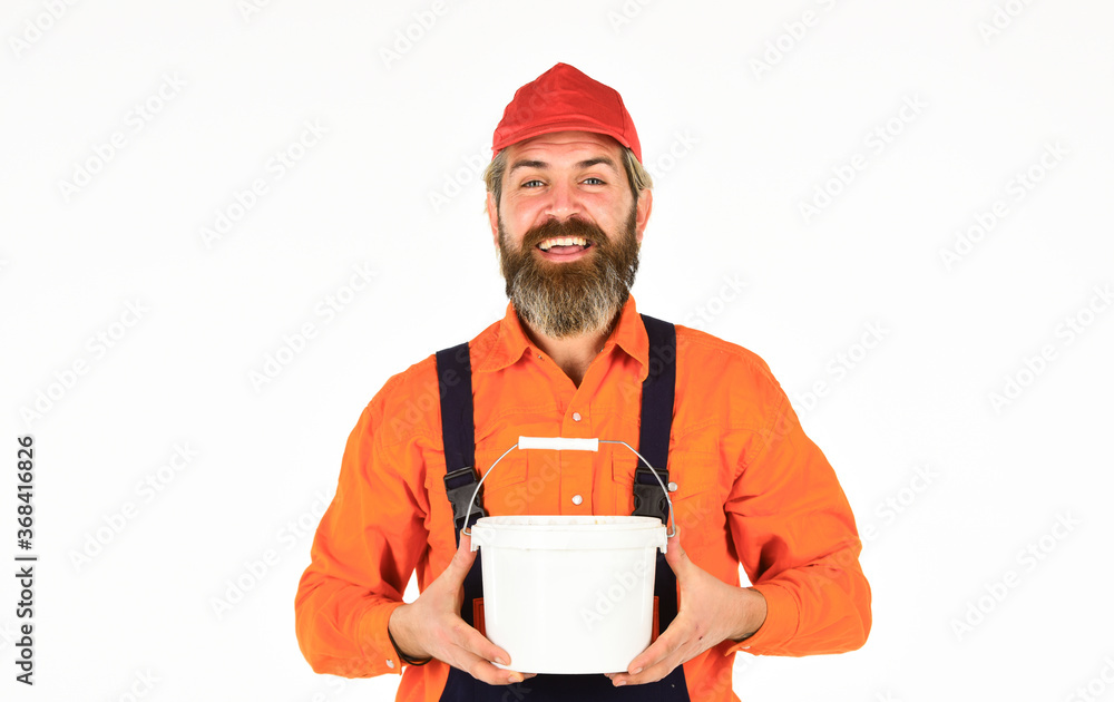 Decoration and decor. Wall painter with paint bucket. Hipster painter. Painters work. Apply plaster in order to finish interior walls. Bearded mature man painter. Construction and renovation Decoration and decor. Wall painter with paint bucket. Hipster painter. Painters work. Apply plaster in order to finish interior walls. Bearded mature man painter. Construction and renovation