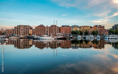Antwerp, Belgium - 19 May 2020: Yachts and lofts in the Antwerp area known as Eilandje photo