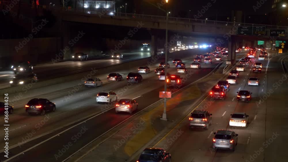 Traffic jam in Los Angeles at night in 4k slow motion 60fps Traffic jam in Los Angeles at night in 4k slow motion 60fps
