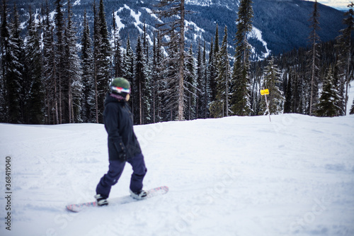 young woman with snowboard