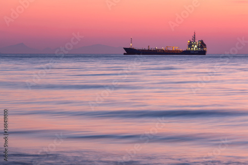 sunset with yachts on santorini island © EriksZ