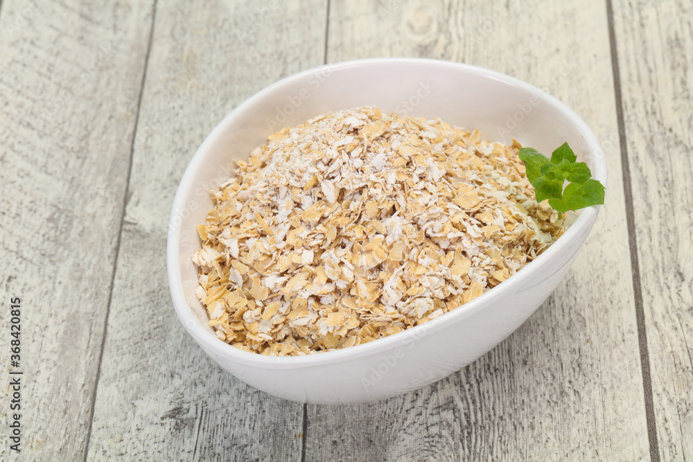 Raw oats in the bowl Raw oats in the bowl