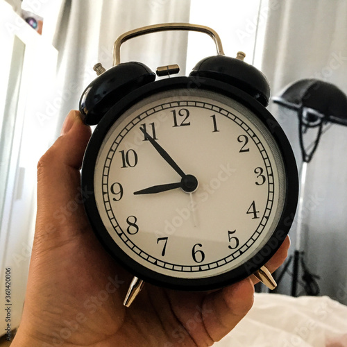 alarm clock on a Hand 