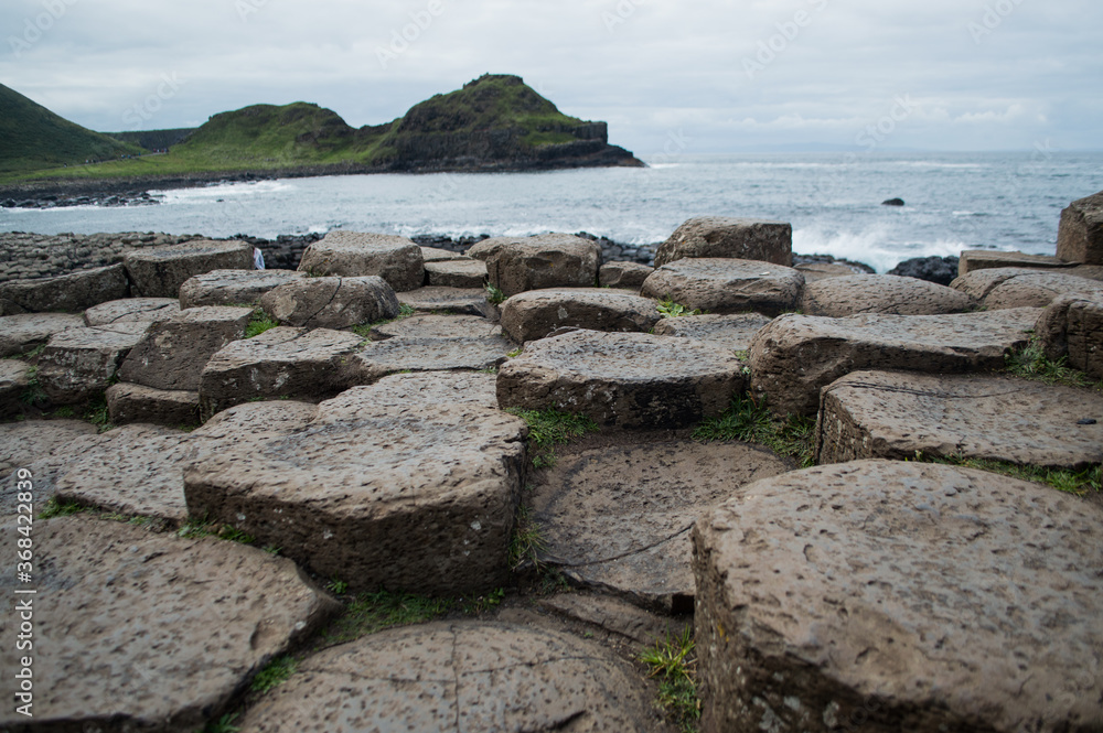 The Giant's Causeway in Northern Ireland, hexagonal rocks on the coast.