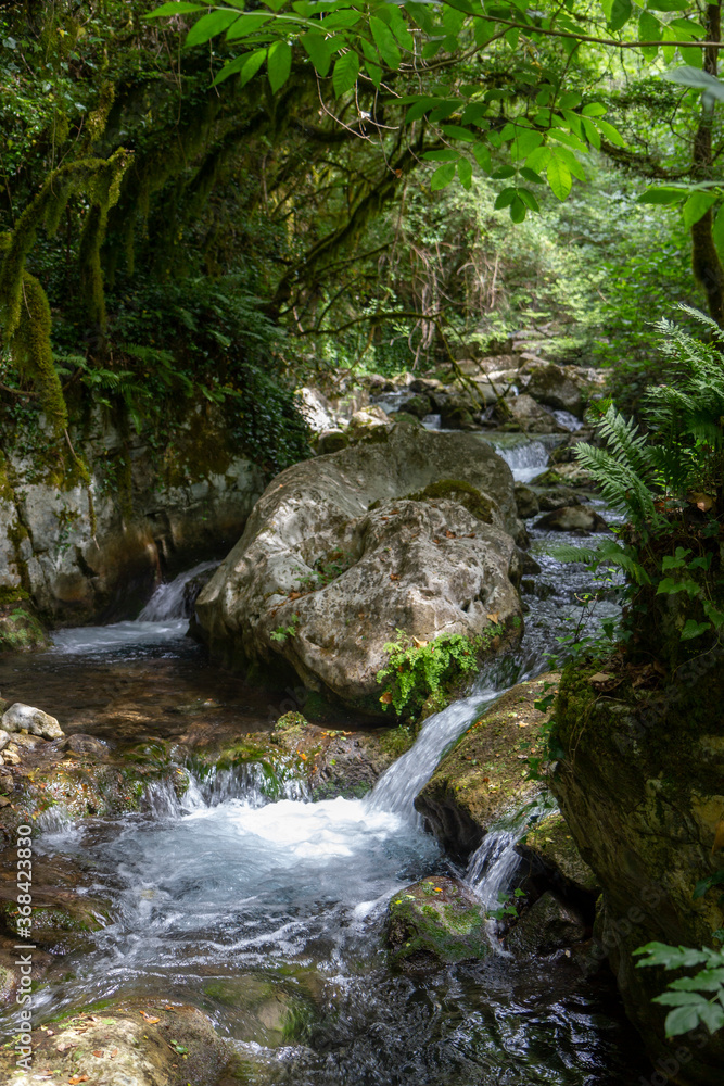 stream and waterfall in morigerati caves of Bussento