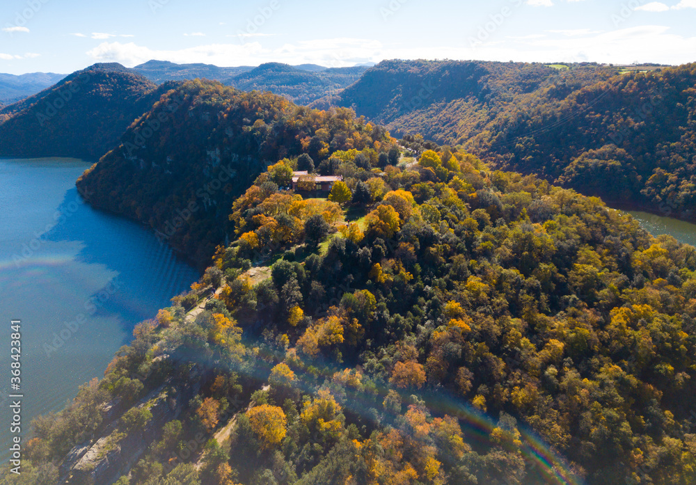 Obraz premium Aerial view from drone of Ter river, Catalonia, at sunny autumn day