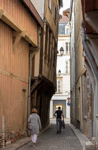  Tourists exploring the narrow streets of medieval Troyes old town,  Aube, Champagne-Ardenne, France © wjarek