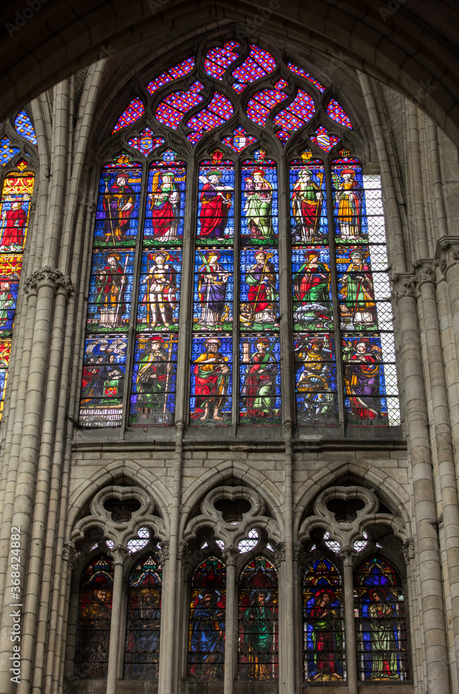 Colorful stained glass windows in Troyes Cathedral dedicated to Saint Peter and Saint Paul. France. Colorful stained glass windows in Troyes Cathedral dedicated to Saint Peter and Saint Paul. France.