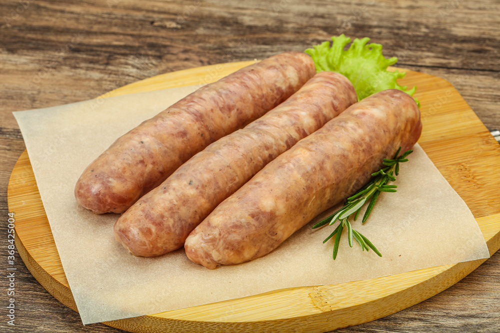 Raw pork meat sausages for grill Raw pork meat sausages for grill