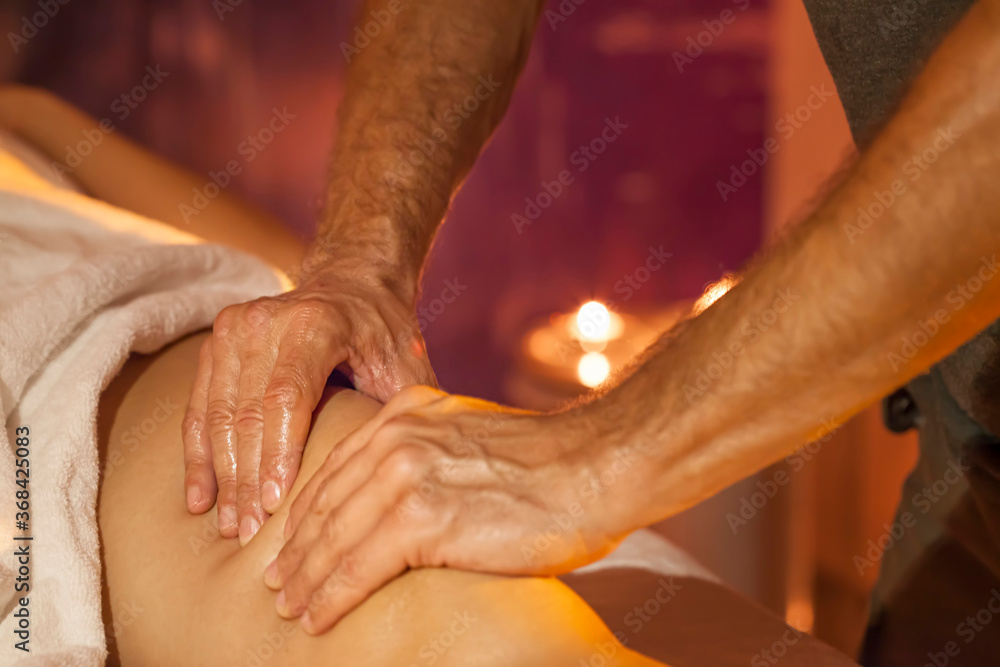 Fototapeta premium Leg massage - Physical therapist doing massage of legs