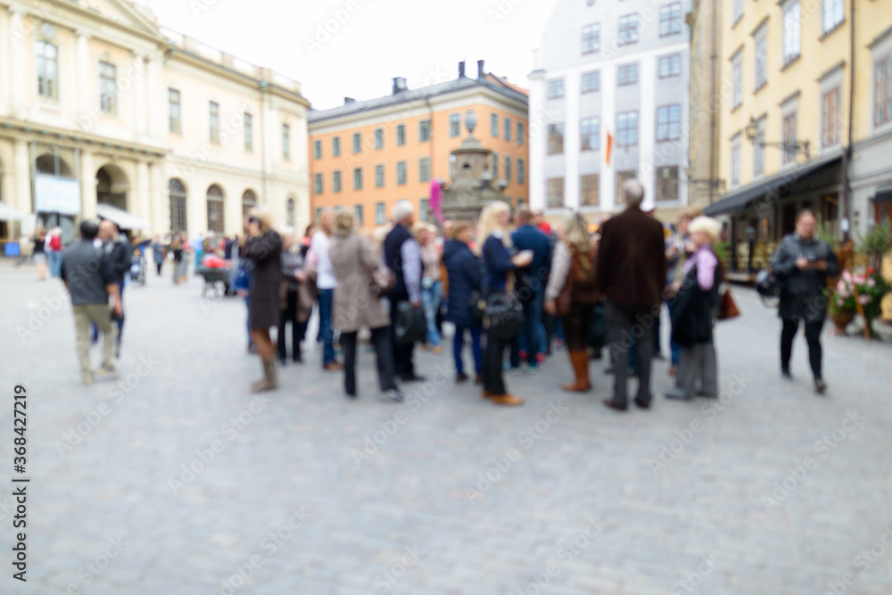 Blurred crowd gathering in the center of the Old Town in Stockholm, Sweden