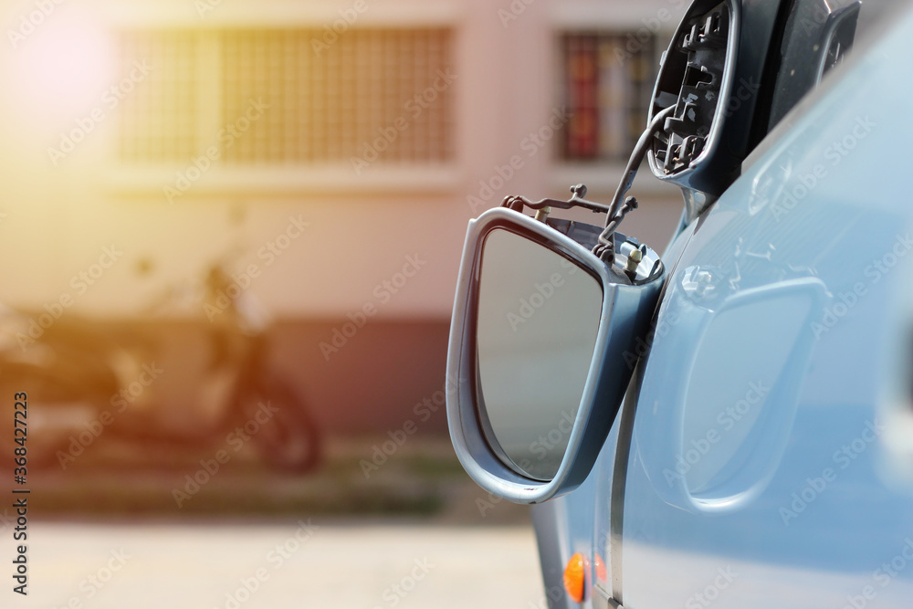 Close up car wing mirror, side view mirror broken from accident. Car