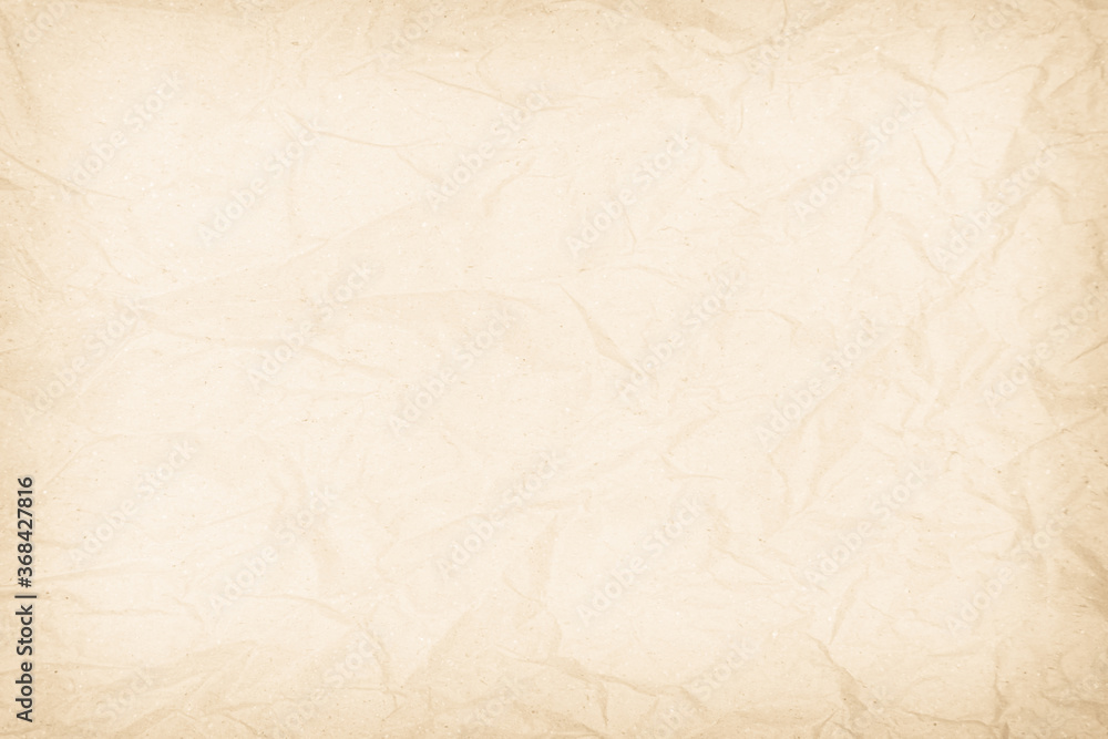 Brown recycled paper crumpled texture background. Cream Old vintage page or grunge vignette parchment old blank newspaper. Pattern empty rough cardboard creased grunge surface backdrop with space. Brown recycled paper crumpled texture background. Cream Old vintage page or grunge vignette parchment old blank newspaper. Pattern empty rough cardboard creased grunge surface backdrop with space.
