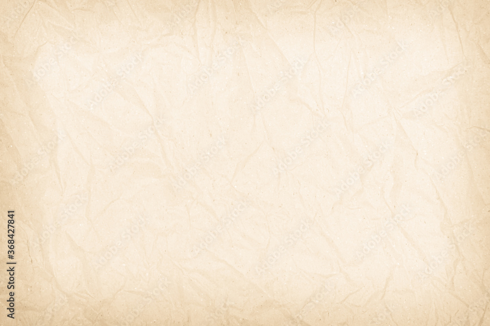 Brown recycled paper crumpled texture background. Cream Old vintage page or grunge vignette parchment old blank newspaper. Pattern empty rough cardboard creased grunge surface backdrop with space. Brown recycled paper crumpled texture background. Cream Old vintage page or grunge vignette parchment old blank newspaper. Pattern empty rough cardboard creased grunge surface backdrop with space.