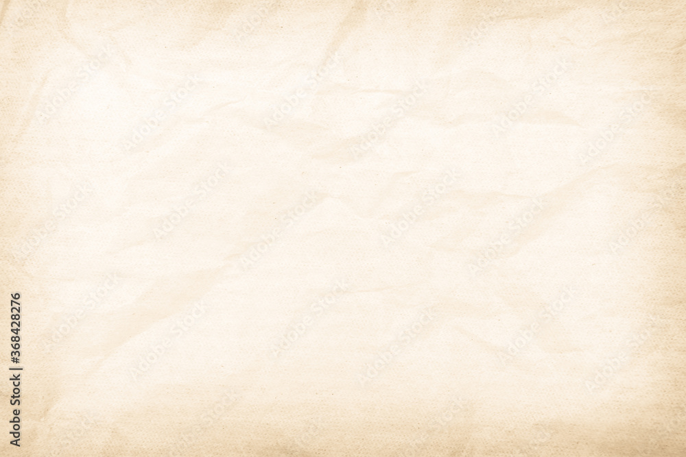 Brown recycled paper crumpled texture background. Cream Old vintage page or grunge vignette parchment old blank newspaper. Pattern empty rough cardboard creased grunge surface backdrop with space. Brown recycled paper crumpled texture background. Cream Old vintage page or grunge vignette parchment old blank newspaper. Pattern empty rough cardboard creased grunge surface backdrop with space.