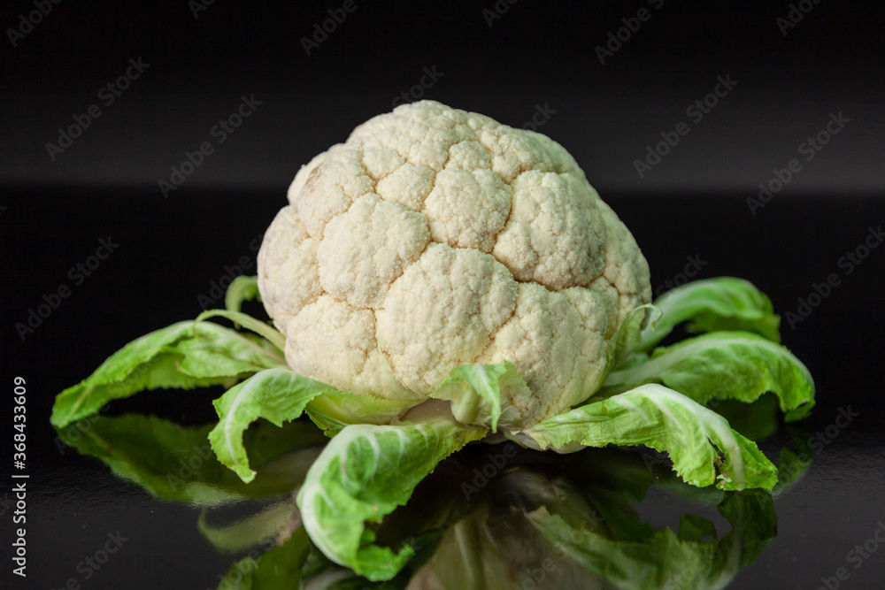 Fresh Cauliflower on black background Fresh Cauliflower on black background