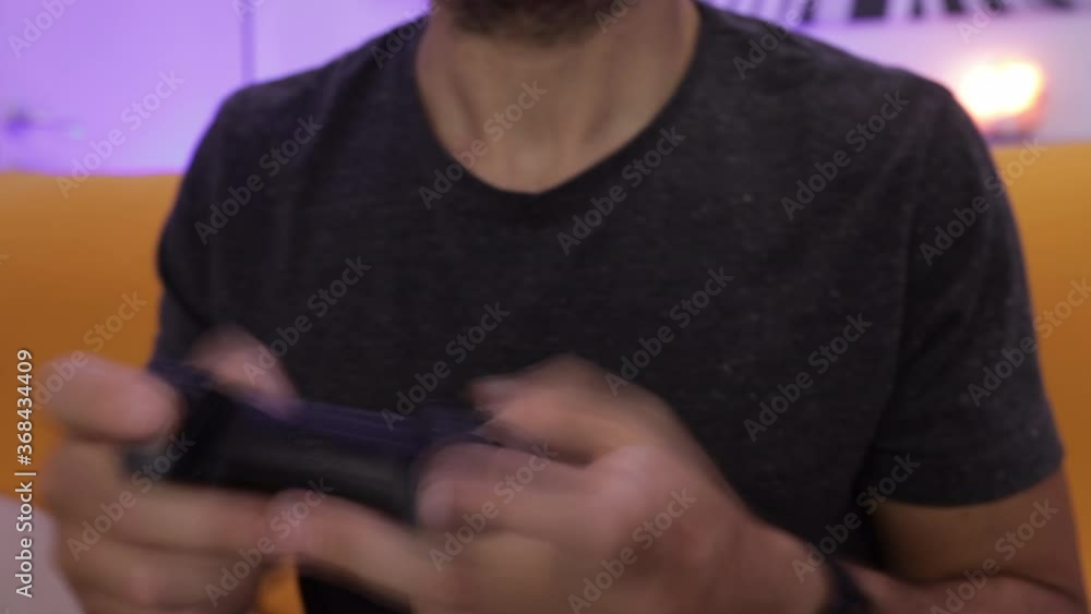 Time lapse: man plays a video game. Close up of hands. Recreation and play time. Shallow depth of field Time lapse: man plays a video game. Close up of hands. Recreation and play time. Shallow depth of field