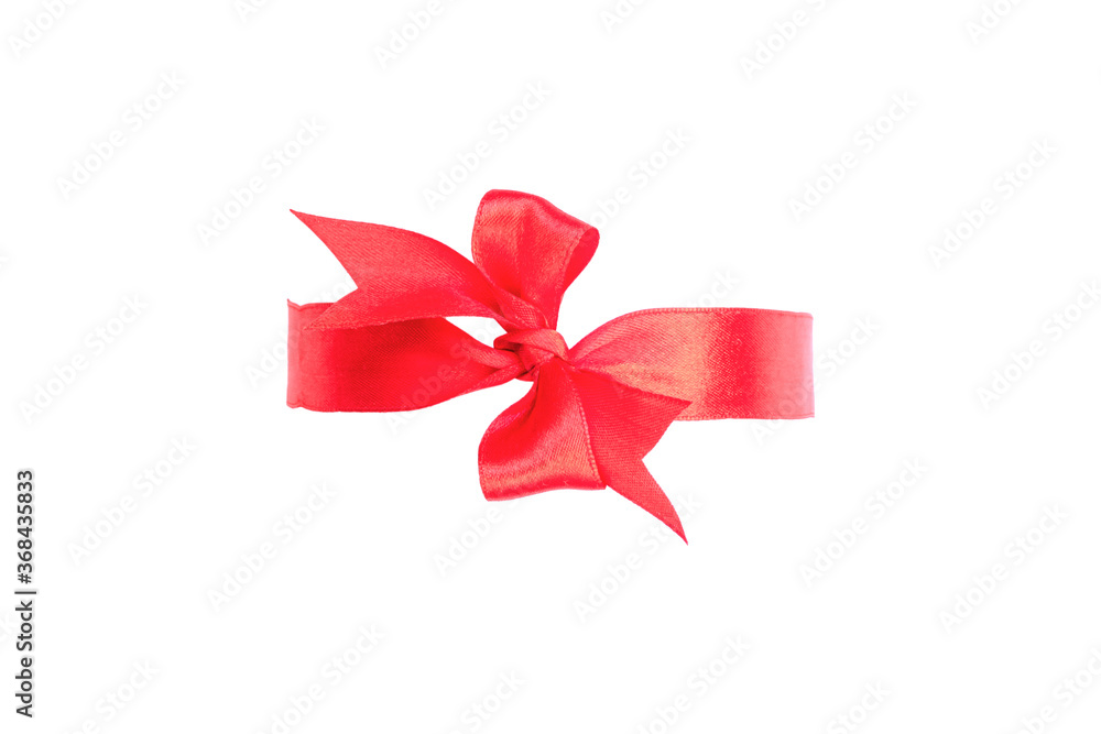 Decorative coral red silk bow. Large width, handmade. Isolated on white. Festive and wedding topics. Decorative coral red silk bow. Large width, handmade. Isolated on white. Festive and wedding topics.