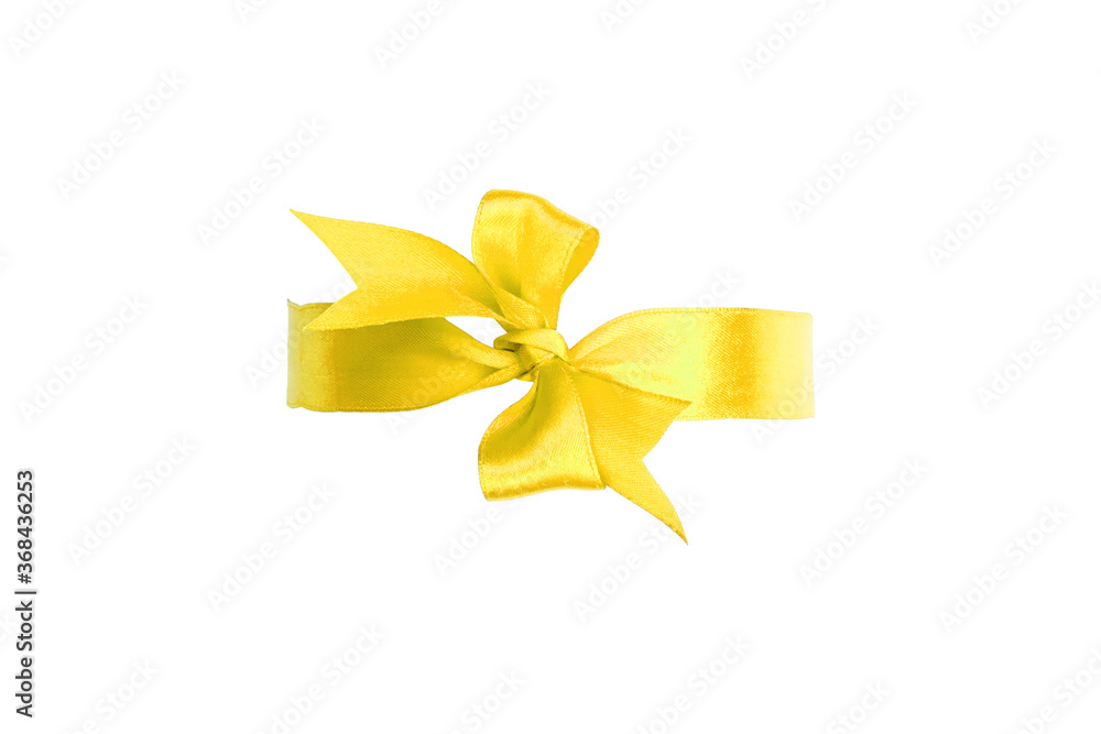 Decorative golden yellow silk bow. Large width, handmade. Isolated on white Decorative golden yellow silk bow. Large width, handmade. Isolated on white