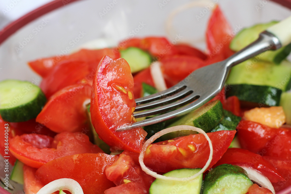 Vegetable salad with tomatoes and cucumbers Vegetable salad with tomatoes and cucumbers