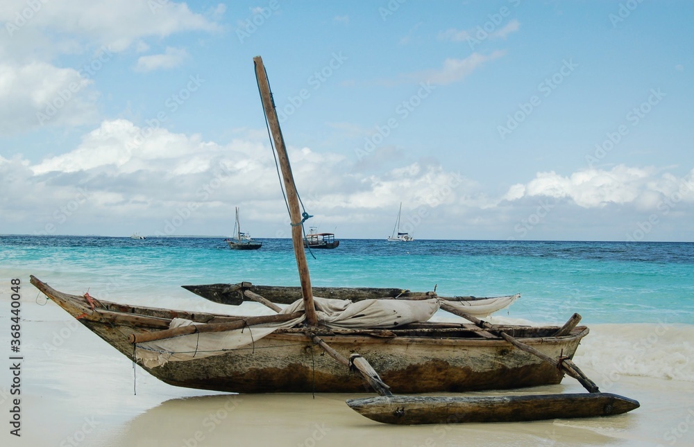 Fototapeta premium Fishing boat on the shore of Jambiani, Zanzibar, Tanzania