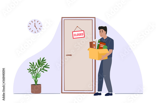 Pensive businessman standing in front of a closed door.