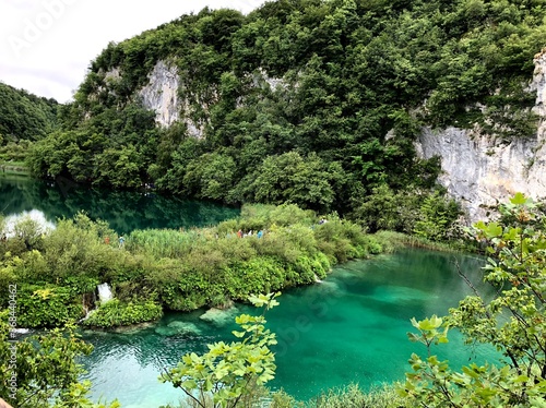 Blue lakes in green foliage.
