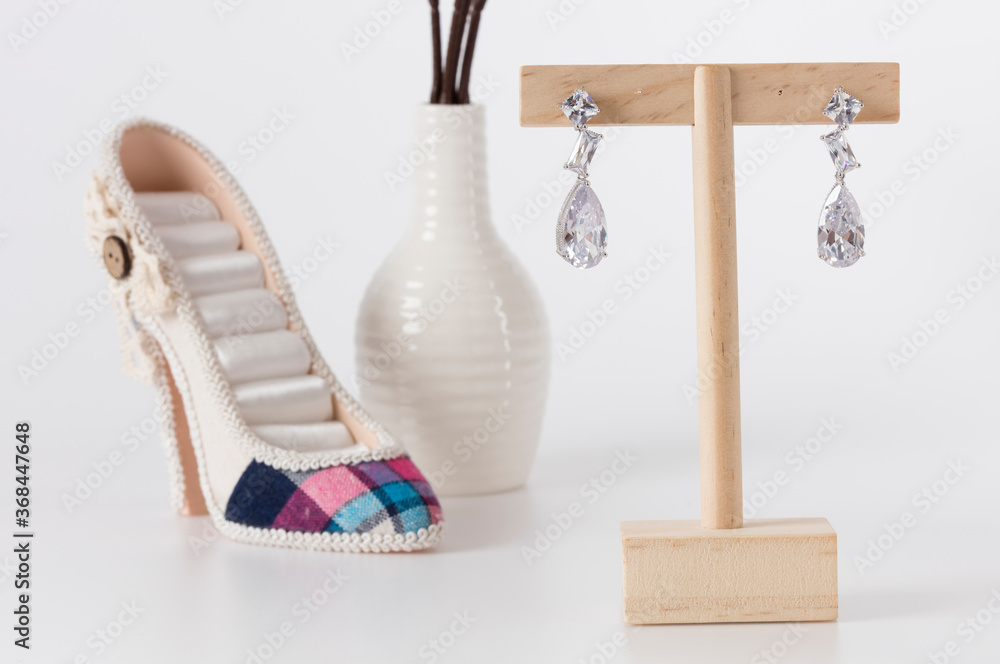 Close up of diamond earrings. space for your text. Close up of diamond earrings. space for your text.
