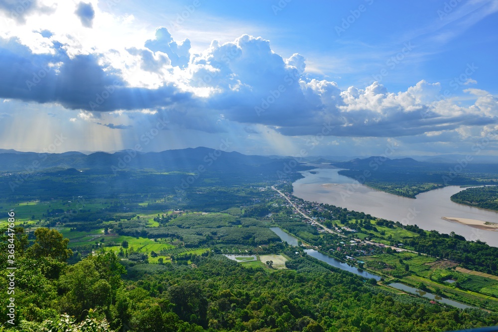 Scenery of Amazing Sky above Mekong river, Mountain and Thai Countryside Nong Khai province, Thailand