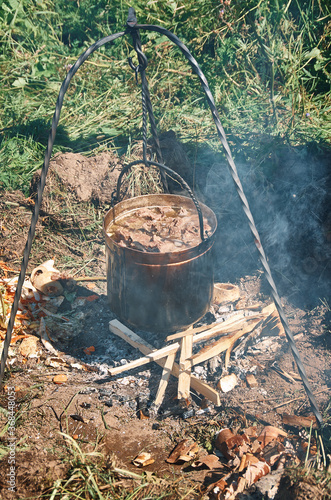 Cooking meat for medieval dinner
