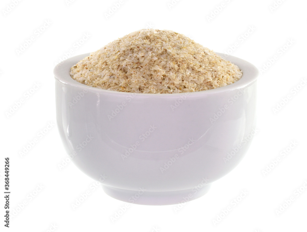 Psyllium (Ispaghula) Seed Husk Isolated on White Background. Dietary Fiber Food Supplement. Psyllium (Ispaghula) Seed Husk Isolated on White Background. Dietary Fiber Food Supplement.